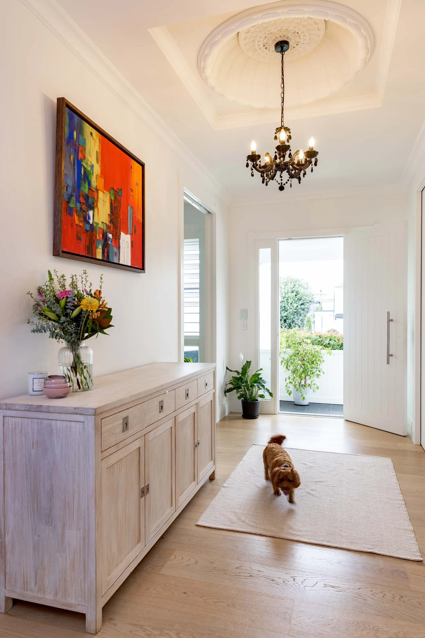 The hallway towards the front door