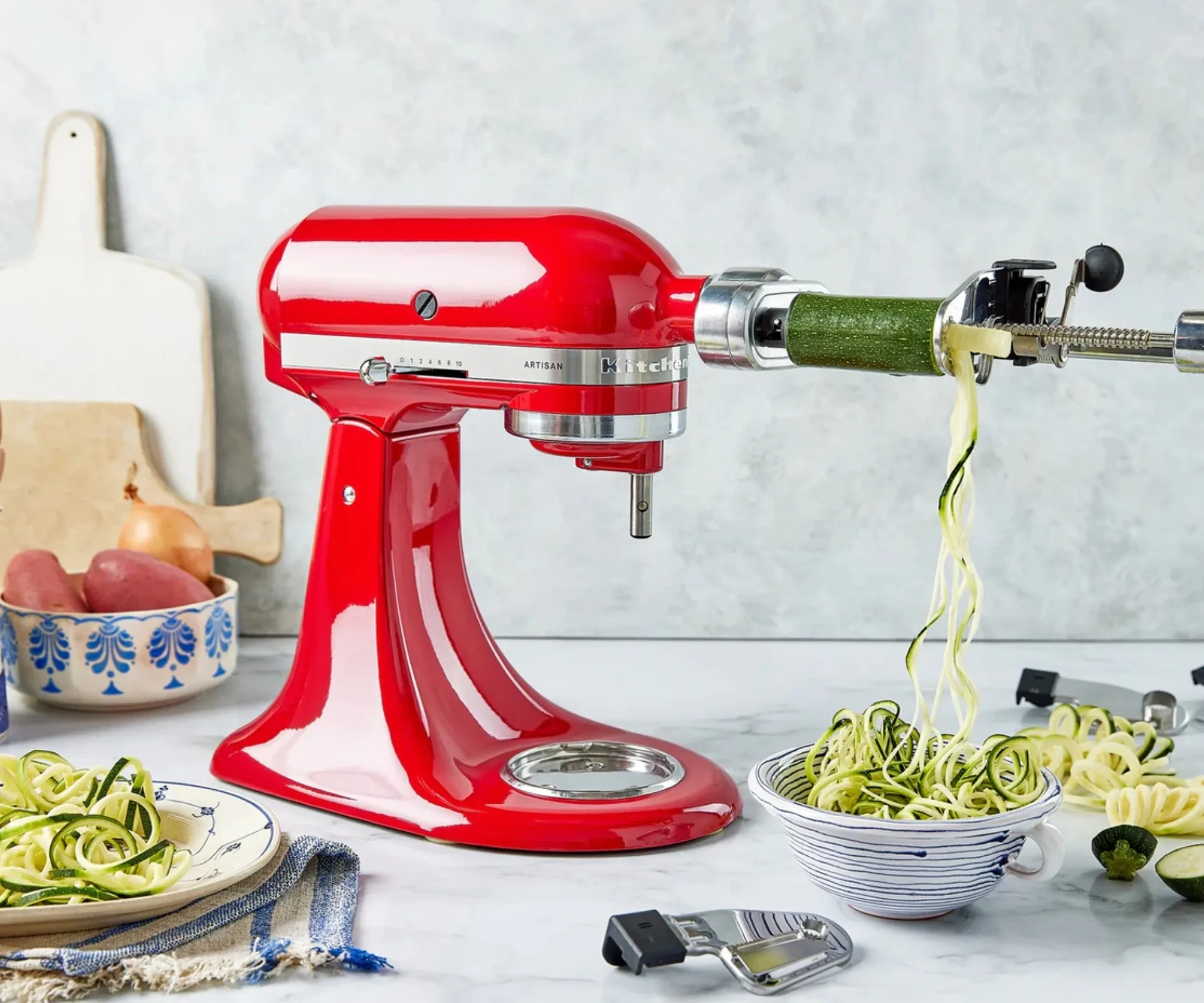 Kitchaid spiralizer on red Kitchenaid mixer