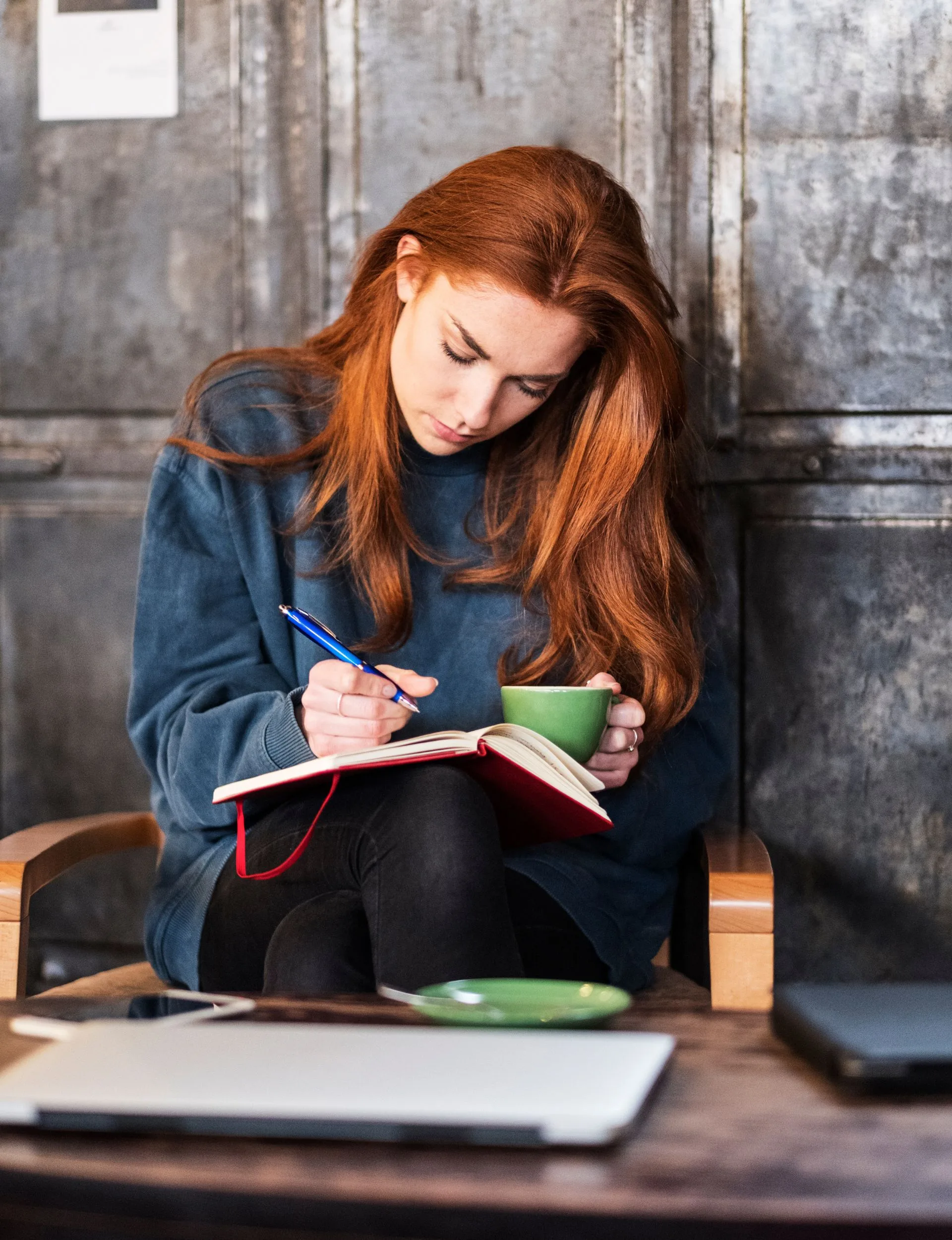 Woman writing in a diary