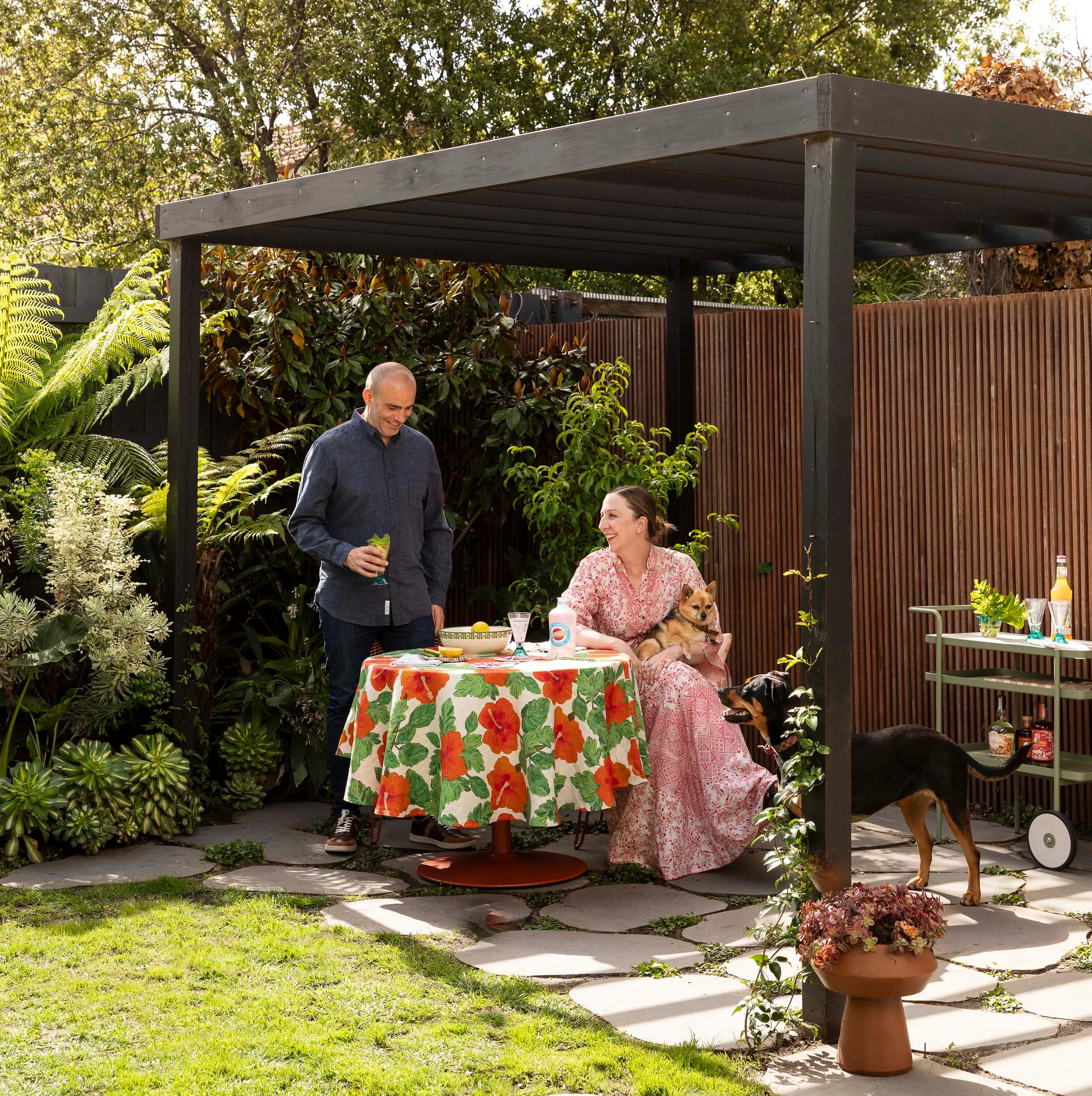 Home owners sitting at their outdoor easting area