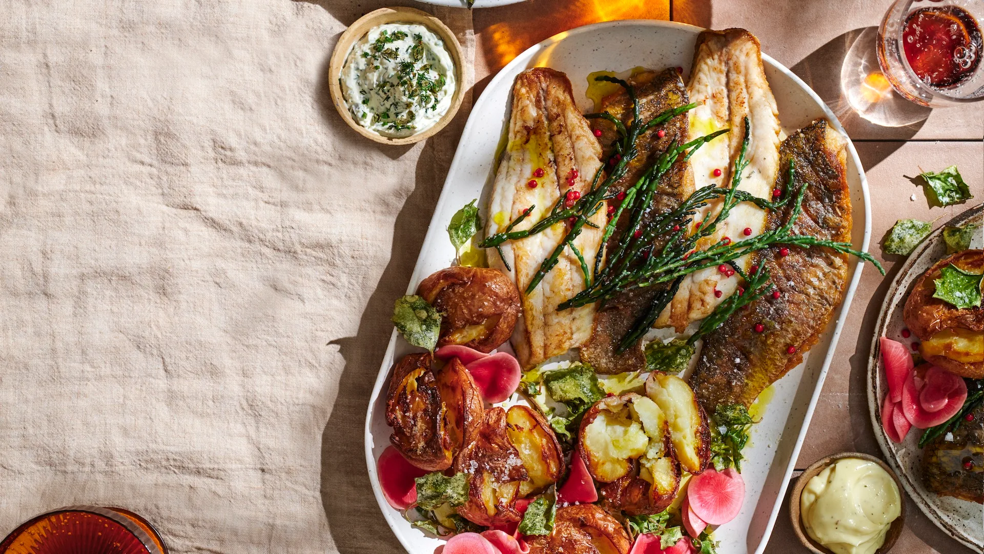 Baked barramundi, a local Australian fish species that is more sustainable than farmed salmon