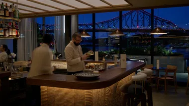 Supernornal Brisbane restaurant interior overlooking Brisbane's Story Bridge
