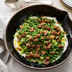 Broad beans with peas and spiced walnuts