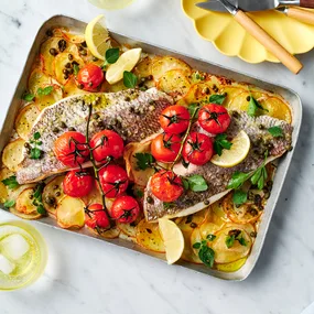 Roast baby snapper with potatoes, lemon and capers