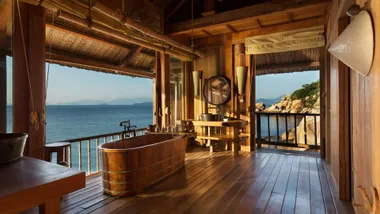 wooden bath in wooden room looking out to ocean in six senses vietnam resort