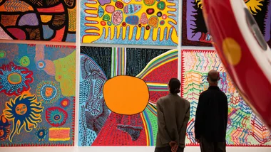 two people looking at Yayoi Kusama artwork at NGV in Melbourne