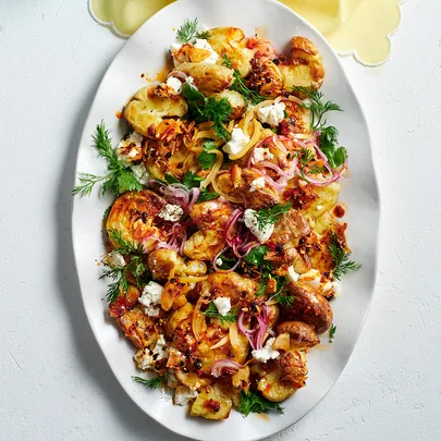 Crunchy chilli and lemon potatoes topped with goat’s cheese