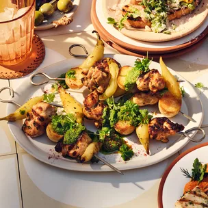 Spanish chicken and potato skewers with charred vegetable salad and mojo verde