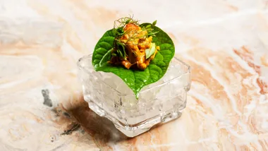 Hand-picked mud crab, preserved chilli, betel leaf and blood lime