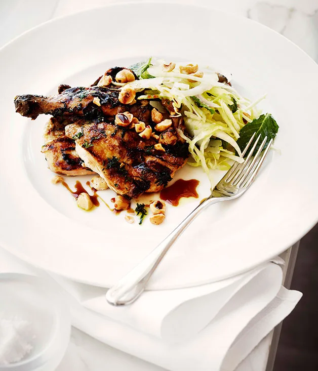 Grilled spatchcock with pear and cabbage salad, hazelnuts and sherry