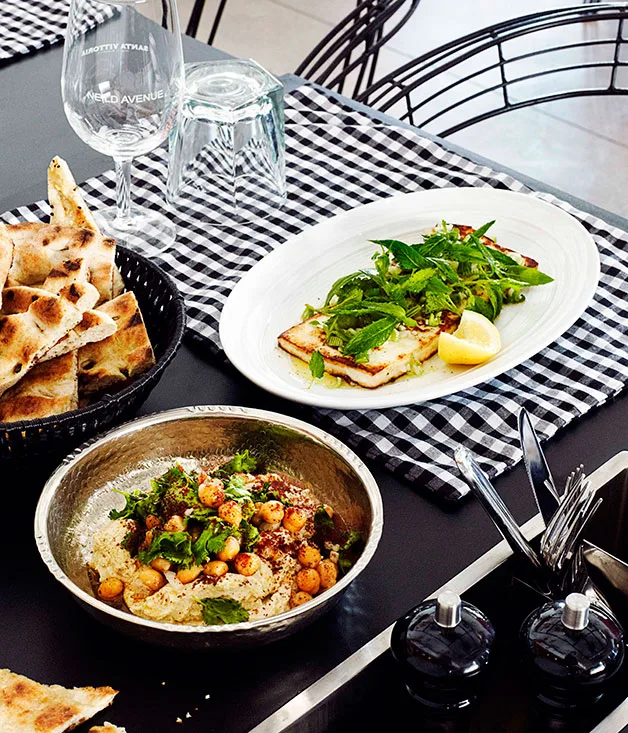 House-made hummus with warm chickpea and coriander salad