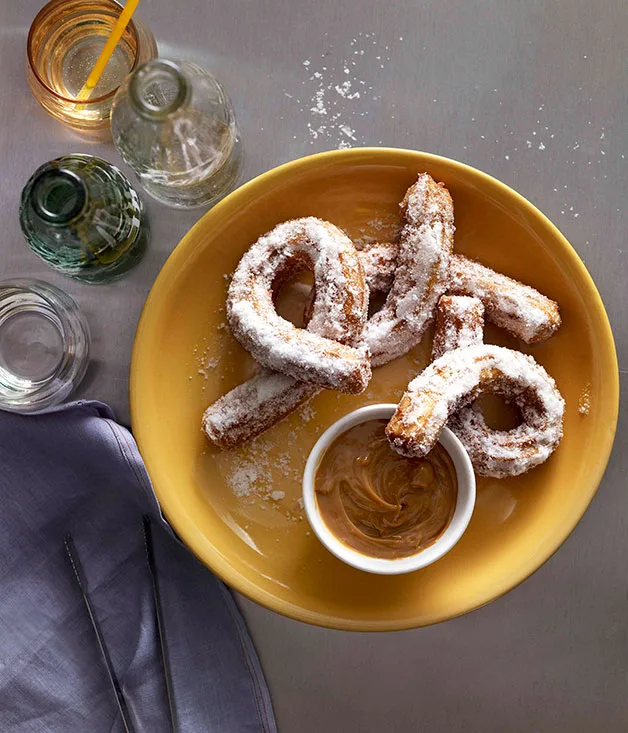 Salty-sweet churros with dulce de leche