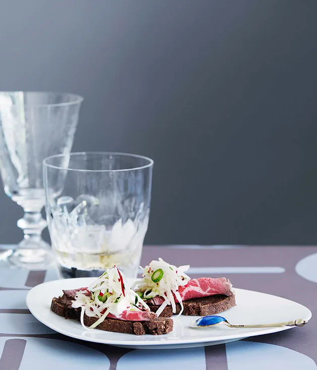 Pumpernickel with spiced wagyu tenderloin and pickled cabbage