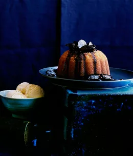 Honey and cardamom pudding with spiced pears and crème fraîche ice-cream