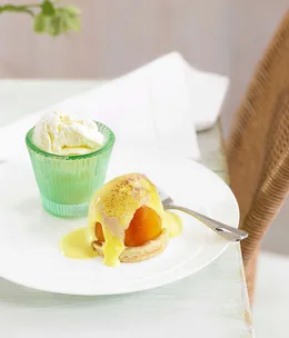 Baked peaches with Amaretto sabayon