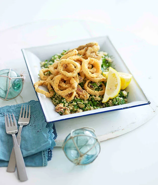 Fried calamari with amaranth, dill and currants