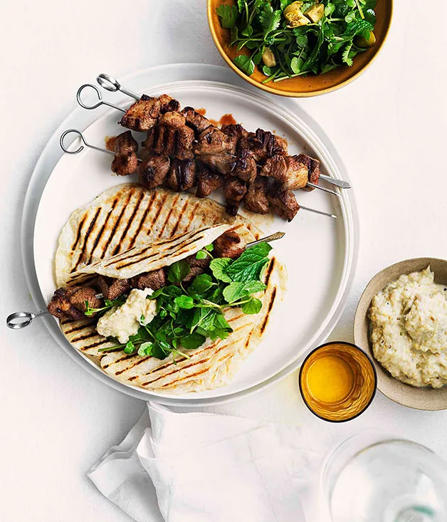 Grilled cumin and chilli lamb skewers with smoky eggplant purée