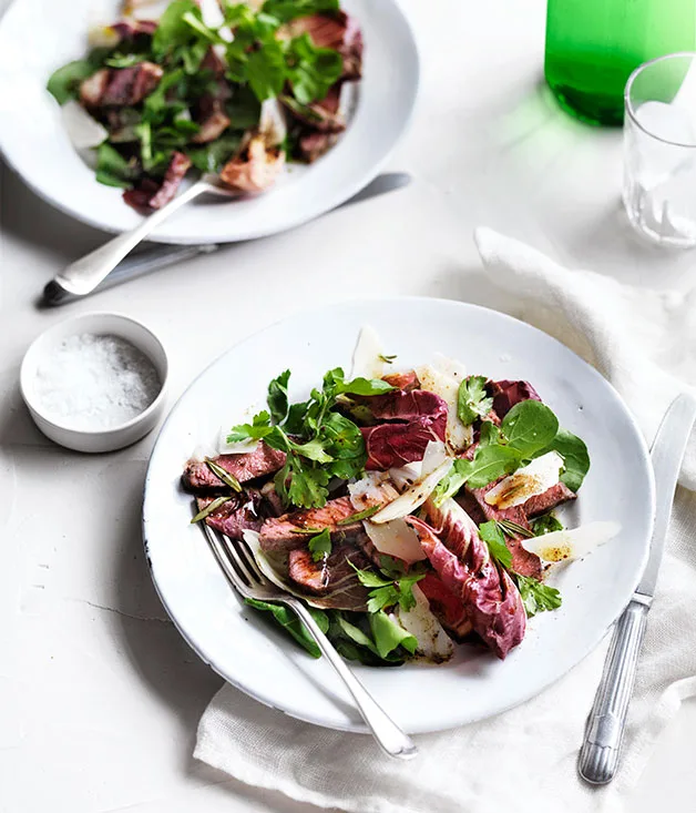 Tagliata salad with warm garlic and anchovy dressing