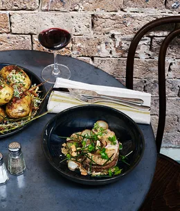 Pork neck cooked in whey “reinvigorated”