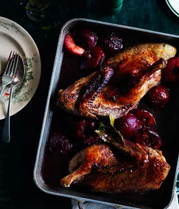 Duck roasted in Lambrusco with blood plums and bay