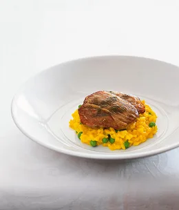 Veal saltimbocca with risotto Milanese