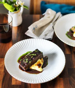 Braised short ribs with pomme purée and gremolata