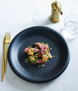 Lamb with ginger, clams and grilled lettuce