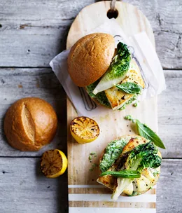 Fish burger with minty pea mayo and charred lettuce