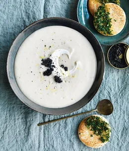 Roast garlic and potato soup with caviar and herb toast