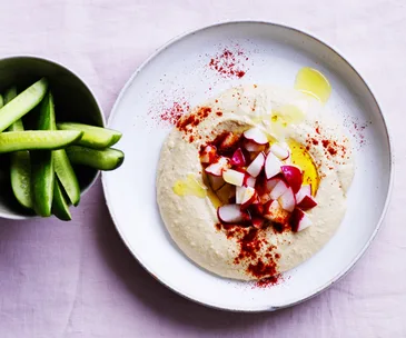 Hummus with radishes and paprika