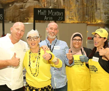 Matt Moran, OzHarvest CEO Ronni Kahn and volunteers at the 2017 CEO Cook Off