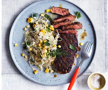 Smoky sirloin steaks with corn and cabbage slaw