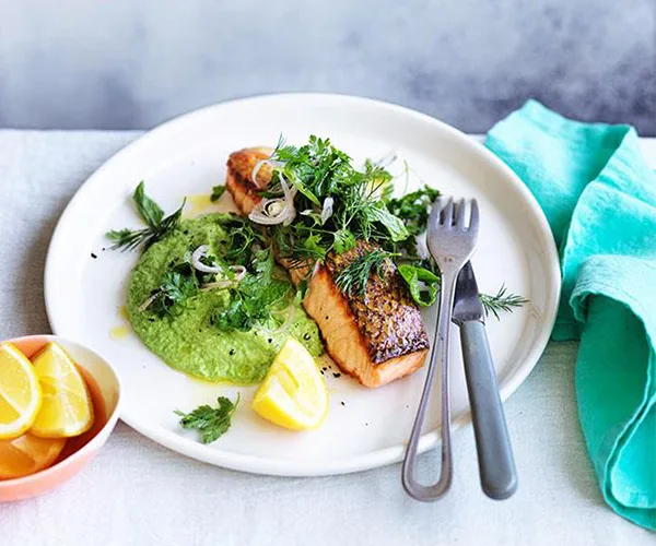 Crisp-skinned salmon with pea purée and soft-herb salad