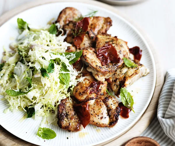 Tarragon chicken thighs with crisp prosciutto, fennel and cabbage