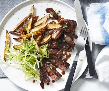 Sirloin steak with red wine sauce and kipfler chips