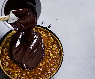 Salted-caramel macadamia tart with chocolate ganache