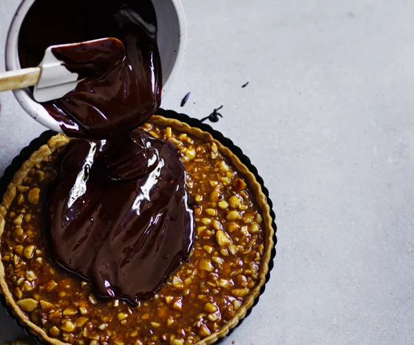 Salted-caramel macadamia tart with chocolate ganache