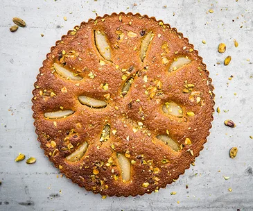Bourke Street Bakery's pear and pistachio love cake, part of the #BakeForSyria cookbook