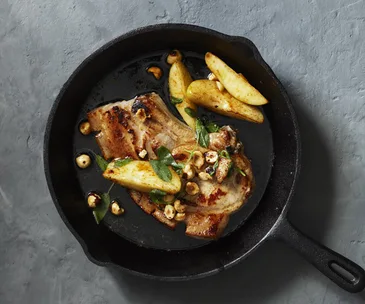 Pork chops with hazelnut and sage