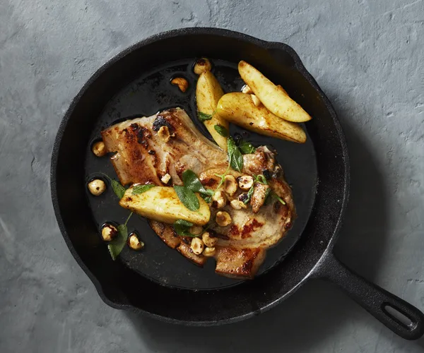 Pork chops with hazelnut and sage