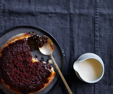 Treacle pudding with vanilla custard