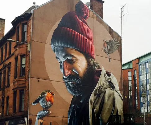 High Street mural of Saint Mungo by Sam Bates, aka Smug.