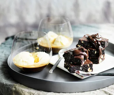 Chocolate and coffee fudge cakes with Bourbon chocolate sauce