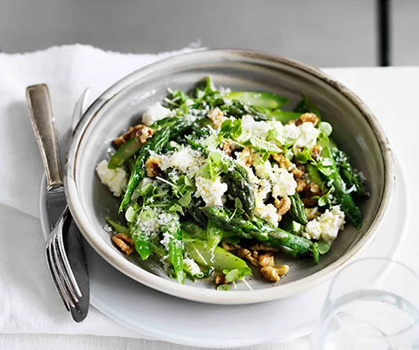 Warm asparagus salad with walnuts, parmesan, lemon and olive oil