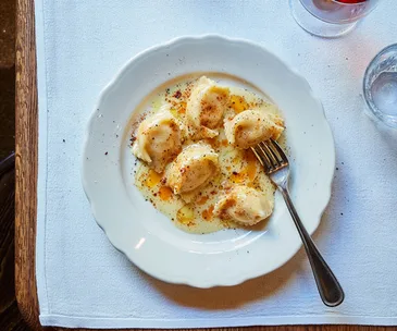 Ricotta agnolotti with anchovy butter 