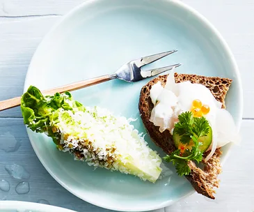 Baby lettuce hearts with pistachio dressing and parmesan