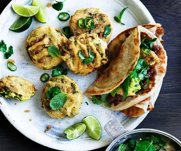 Spiced potato and pea fritters with sweet and sour chutney