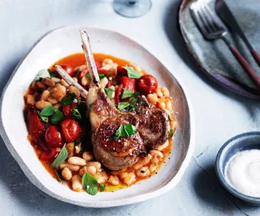 Lamb cutlets with white beans, capsicum and oregano