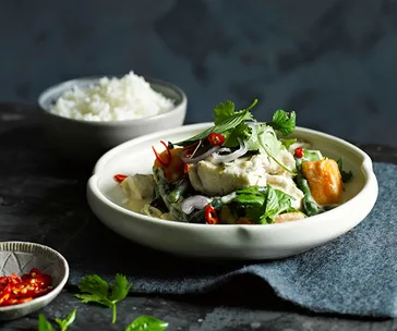Coconut-poached barramundi with pumpkin and snake beans