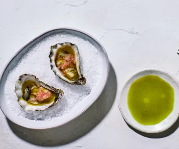 Raes on Wategos’ oysters with lemon-aspen vinegar, anise-myrtle oil and finger lime